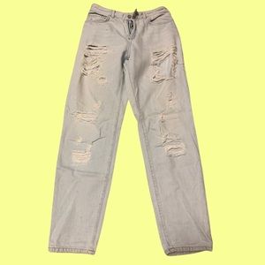 Vintage Light washed ripped rugged jeans high waisted, loose leg, with tailoring